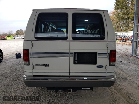 1997 Ford Econoline Commercial z VIN 1FDEE14L8VHB55692, wystawiony jako Copart lot #77627564 z przebiegiem 124 927 mil mil oraz Szkody całkowita. Historia ofert i sprzedaży dostępna na DreamBid. Obrazek 6.