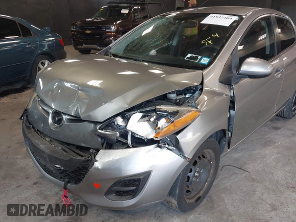 2012 Mazda 2 Sport with VIN JM1DE1KY7C0150803, listed as a IAAI auction lot 41932409 with 89,474 mi miles. Bid and sale history available at carsss.com. Image 6.