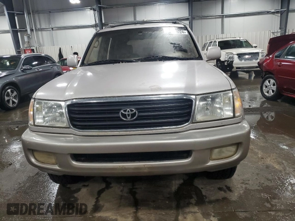 2000 Toyota Land Cruiser with VIN JT3HT05J6Y0105489, listed as a Copart auction lot 86409724 with 223,198 mi miles and Clean Title. Bid and sale history available at carsss.com. Image 5.