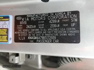 2011 Kia Optima LX with VIN KNAGM4A79B5172939, listed as a Copart auction lot 48065655 with 122,992 mi miles and Salvage Title. Bid and sale history available at carsss.com. Image 12.