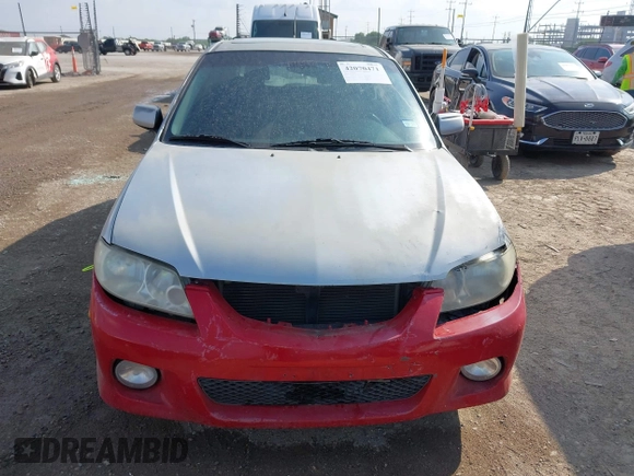 2003 Mazda Protege with VIN JM1BJ245031218333, listed as a IAAI auction lot 42070471 with 181,748 mi miles and . Bid and sale history available at DreamBid. Image 12.