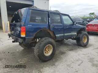 2000 Jeep Cherokee with VIN 1J4FF48S7YL209729, listed as a Copart auction lot 53647685 with 268,552 mi miles and Salvage title. Bid and sale history available at DreamBid. Image 3.