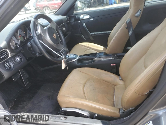 2009 Porsche 911 Carrera S z VIN WP0AB29929S720512, wystawiony jako Copart lot #56697685 z przebiegiem 36 676 mil mil oraz Szkoda całkowita • Salvage title. Historia ofert i sprzedaży dostępna na DreamBid. Obrazek 7.