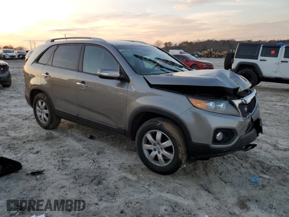2012 Kia Sorento LX with VIN 5XYKTCA69CG256544, listed as a Copart auction lot 85510044 with 167,395 mi miles and Salvage Title. Bid and sale history available at DreamBid. Image 4.