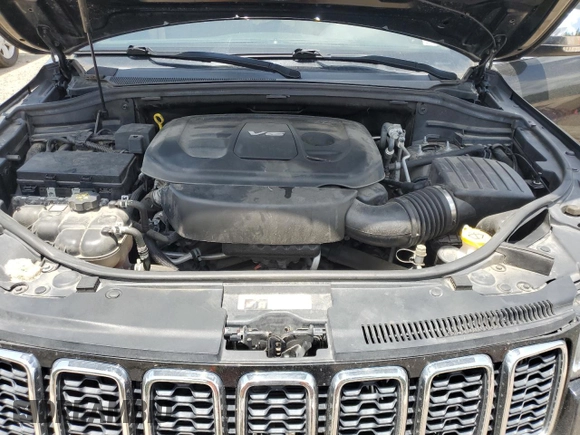 2018 Jeep Grand Cherokee Sterling z VIN 1C4RJEBG4JC241944, wystawiony jako Copart lot #61679565 z przebiegiem 83 480 mil mil oraz Szkoda całkowita • Salvage title. Historia ofert i sprzedaży dostępna na DreamBid. Obrazek 11.