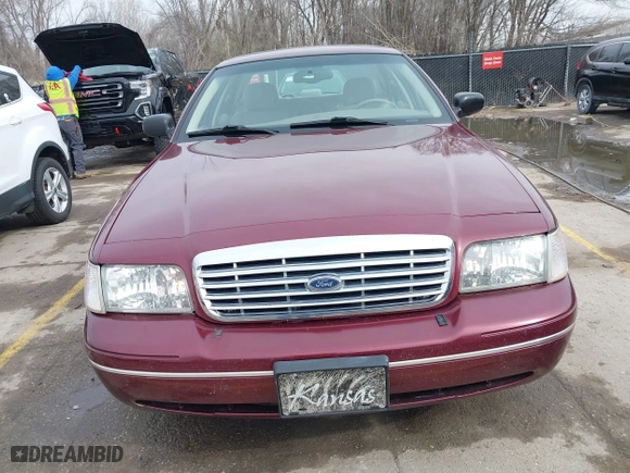 2005 Ford Crown Victoria LX with VIN 2FAFP74W25X106106, listed as a IAAI auction lot 41825793 with 175,740 mi miles. Bid and sale history available at carsss.com. Image 12.
