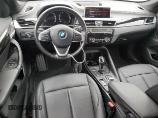 2021 BMW X1 xDrive28i with VIN WBXJG9C09M5U35093, listed as a Copart auction lot 65509155 with 46,875 mi miles and Salvage title. Bid and sale history available at DreamBid. Image 8.