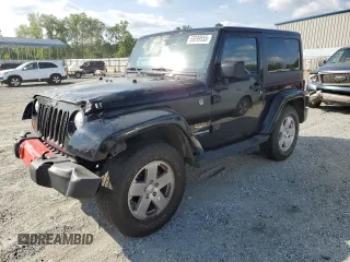 2012 Jeep Wrangler Sahara z VIN 1C4AJWBG6CL236704, wystawiony jako Copart lot #55099555 z przebiegiem 102 180 mil mil oraz Szkoda całkowita • Salvage title. Historia ofert i sprzedaży dostępna na DreamBid. Obrazek 1.