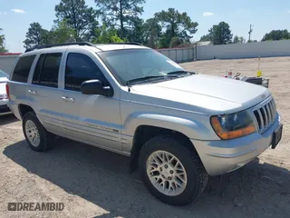 2002 Jeep Grand Cherokee Limited with VIN 1J8GW58S62C253818, listed as a IAAI auction lot 41983592 with 165,378 mi miles. Bid and sale history available at carsss.com. Image 6.