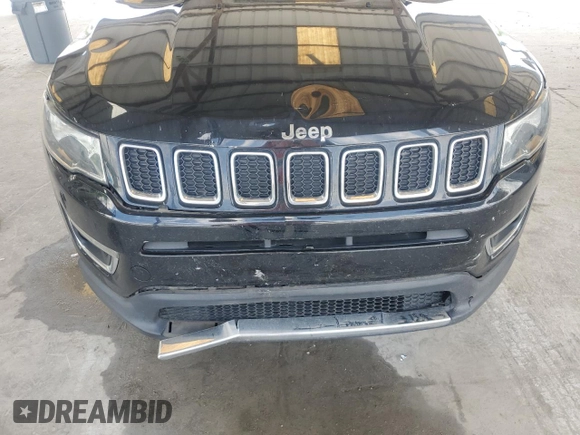 2018 Jeep Compass Limited with VIN 3C4NJDCBXJT258828, listed as a Copart auction lot 56818835 with 115,721 mi miles and Salvage title. Bid and sale history available at DreamBid. Image 11.