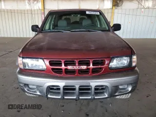 2002 Isuzu Rodeo z VIN 4S2CK57D924300875, wystawiony jako Copart lot #76639584 z przebiegiem 142 122 mil mil oraz Szkody całkowita. Historia ofert i sprzedaży dostępna na DreamBid. Obrazek 5.