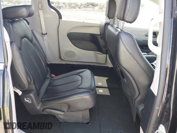 2023 Chrysler Pacifica Touring L with VIN 2C4RC1BG9PR628170, listed as a IAAI auction lot 42515590 with 41,987 mi miles and . Bid and sale history available at DreamBid. Image 8.