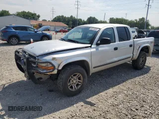 2003 Dodge Dakota SLT with VIN 1D7HG48N73S127509, listed as a Copart auction lot 65515595 with 161,928 mi miles and Salvage title. Bid and sale history available at DreamBid. Image 1.