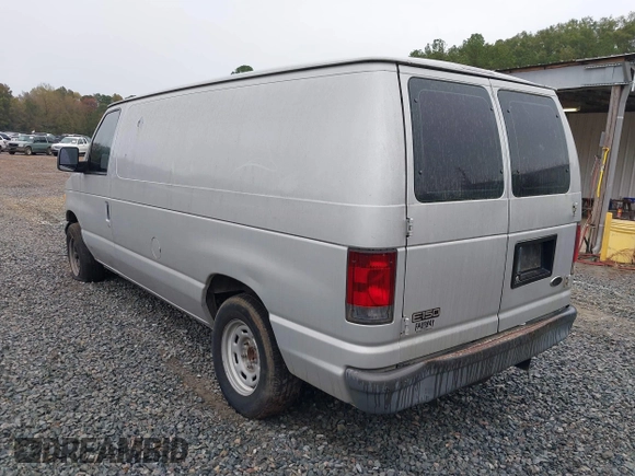 2005 Ford Econoline Cargo with VIN 1FTRE14W85HA67080, listed as a IAAI auction lot 40910996 with 599,247 mi miles. Bid and sale history available at carsss.com. Image 3.