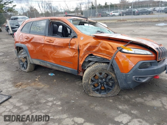 2015 Jeep Cherokee Trailhawk z VIN 1C4PJMBS9FW750858, wystawiony jako IAAI lot #41741305 z przebiegiem Nie podano mil oraz . Historia ofert i sprzedaży dostępna na DreamBid. Obrazek 1.