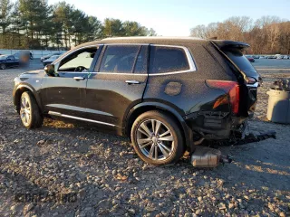 2023 Cadillac XT6 FWD Premium Luxury z VIN 1GYKPCRS7PZ105628, wystawiony jako Copart lot #84841124 z przebiegiem Nie podano mil oraz Szkoda całkowita • Salvage title. Historia ofert i sprzedaży dostępna na DreamBid. Obrazek 2.