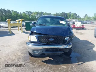 2003 Ford F-150 XL with VIN 1FTRX18LX3NA50127, listed as a IAAI auction lot 42145481 with 199,955 mi miles and . Bid and sale history available at DreamBid. Image 12.