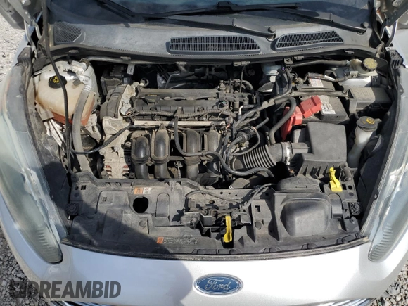 2016 Ford Fiesta SE z VIN 3FADP4BJ3GM142298, wystawiony jako Copart lot #54320835 z przebiegiem 144 636 mil mil oraz Szkoda całkowita • Salvage title. Historia ofert i sprzedaży dostępna na DreamBid. Obrazek 11.
