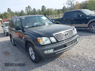 2007 Lexus LX 470 z VIN JTJHT00W674029596, wystawiony jako IAAI lot #41904382 z przebiegiem 233 640 mil mil oraz . Historia ofert i sprzedaży dostępna na DreamBid. Obrazek 1.