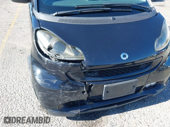 2009 Smart fortwo Pure z VIN WMEEJ31X49K218655, wystawiony jako IAAI lot #40850458 z przebiegiem 243 075 mil mil oraz . Historia ofert i sprzedaży dostępna na DreamBid. Obrazek 6.