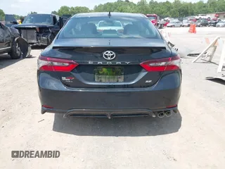 2023 Toyota Camry SE z VIN 4T1T11AK9PU721786, wystawiony jako IAAI lot #42279812 z przebiegiem 30 707 mil mil oraz . Historia ofert i sprzedaży dostępna na DreamBid. Obrazek 16.