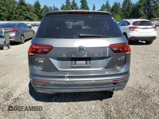 2018 Volkswagen Tiguan SEL с VIN 3VV2B7AX3JM221941, выставлен на аукционе Copart как лот 64656555 с пробегом Не указан миль и Списание • Salvage title. История ставок и продаж доступна на DreamBid. Изображение 6.