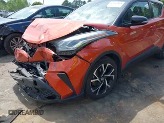 2020 Toyota C-HR LE z VIN NMTKHMBX9LR107762, wystawiony jako IAAI lot #42158899 z przebiegiem 90 313 mil mil oraz . Historia ofert i sprzedaży dostępna na DreamBid. Obrazek 17.