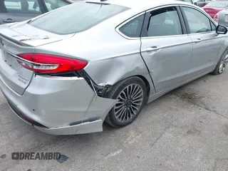 2017 Ford Fusion Hybrid Titanium с VIN 3FA6P0RU5HR181755, выставлен на аукционе IAAI как лот 42704832 с пробегом 152 688 миль миль и . История ставок и продаж доступна на DreamBid. Изображение 6.