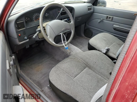 1991 Toyota Pickup DLX с VIN JT4RN93P9M5040575, выставлен на аукционе Copart как лот 58934495 с пробегом 43 376 миль миль и Списание • Salvage title. История ставок и продаж доступна на DreamBid. Изображение 8.