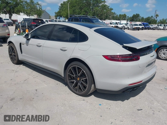 2018 Porsche Panamera 4 E-Hybrid z VIN WP0AE2A7XJL174378, wystawiony jako IAAI lot #42303125 z przebiegiem 35 636 mil mil oraz . Historia ofert i sprzedaży dostępna na DreamBid. Obrazek 3.