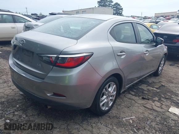 2016 Scion iA with VIN 3MYDLBZV7GY123315, listed as a IAAI auction lot 42168770 with 136,035 mi miles. Bid and sale history available at carsss.com. Image 4.