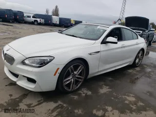 2015 BMW 6 Series 650i with VIN WBA6B2C51FGB99096, listed as a Copart auction lot 86803534 with 114,615 mi miles and Clean Title. Bid and sale history available at carsss.com. Image 1.