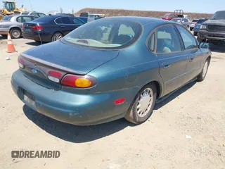 1996 Ford Taurus GL with VIN 1FALP52U3TG139417, listed as a IAAI auction lot 42760633 with 239,490 mi miles and . Bid and sale history available at DreamBid. Image 4.