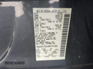 2004 Nissan Titan LE with VIN 1N6AA07B24N574789, listed as a IAAI auction lot 42039183 with 147,691 mi miles. Bid and sale history available at carsss.com. Image 9.