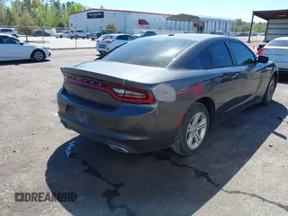 2019 Dodge Charger SXT with VIN 2C3CDXBG3KH748314, listed as a IAAI auction lot 41817204 with 93,266 mi miles. Bid and sale history available at carsss.com. Image 4.