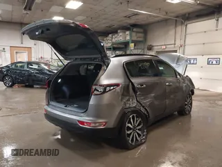 2019 Kia Sportage EX with VIN KNDPNCACXK7550830, listed as a IAAI auction lot 42273807 with 63,645 mi miles and . Bid and sale history available at DreamBid. Image 4.