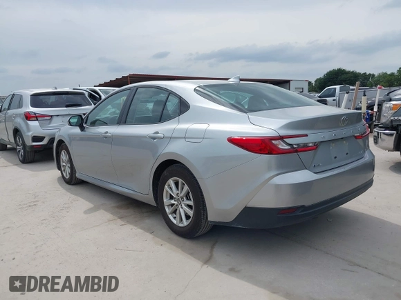 2025 Toyota Camry LE with VIN 4T1DAACK5SU000942, listed as a IAAI auction lot 42144009 with 23,505 mi miles and . Bid and sale history available at DreamBid. Image 3.