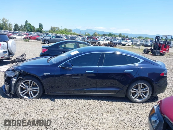 2014 Tesla Model S 60 with VIN 5YJSA1H18EFP31969, listed as a IAAI auction lot 42312485 with 90,043 mi miles and . Bid and sale history available at DreamBid. Image 15.
