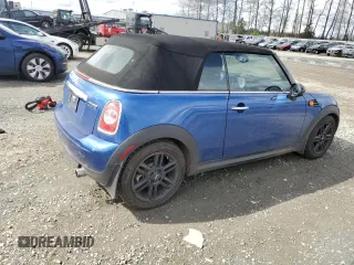 2014 MINI Convertible with VIN WMWZN3C55ET861078, listed as a Copart auction lot 50240665 with 50,541 mi miles and Salvage Title. Bid and sale history available at DreamBid. Image 3.