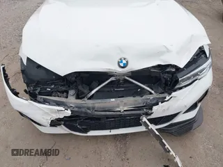 2020 BMW 3 Series M340i with VIN WBA5U7C0XLA232275, listed as a IAAI auction lot 41210369 with 56,220 mi miles and . Bid and sale history available at DreamBid. Image 6.