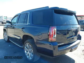 2017 GMC Yukon SLT with VIN 1GKS1BKC9HR356600, listed as a IAAI auction lot 41694218 with 155,855 mi miles. Bid and sale history available at carsss.com. Image 3.