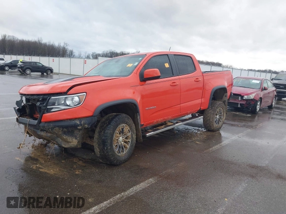 2019 Chevrolet Colorado 4WD ZR2 z VIN 1GCGTEEN1K1160280, wystawiony jako IAAI lot #41166240 z przebiegiem 71 529 mil mil oraz . Historia ofert i sprzedaży dostępna na DreamBid. Obrazek 2.