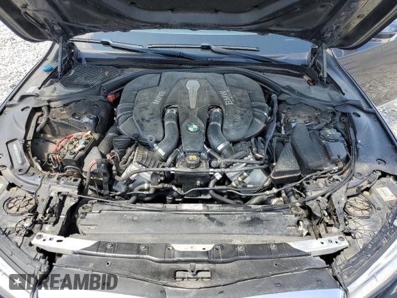 2016 BMW 7 Series 750i xDrive z VIN WBA7F2C54GG416163, wystawiony jako Copart lot #53981095 z przebiegiem 91 822 mil mil oraz Szkoda całkowita • Salvage title. Historia ofert i sprzedaży dostępna na DreamBid. Obrazek 11.