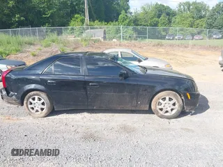 2007 Cadillac CTS z VIN 1G6DP577270133840, wystawiony jako IAAI lot #42301505 z przebiegiem Nie podano mil oraz . Historia ofert i sprzedaży dostępna na DreamBid. Obrazek 13.