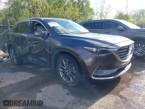 2020 Mazda CX-9 Signature with VIN JM3TCBEYXL0402053, listed as a IAAI auction lot 42070846 with 47,695 mi miles and . Bid and sale history available at DreamBid. Image 1.