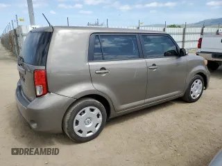 2014 Scion xB z VIN JTLZE4FE6EJ064990, wystawiony jako Copart lot #53554795 z przebiegiem 180 198 mil mil oraz Szkoda całkowita • Salvage title. Historia ofert i sprzedaży dostępna na DreamBid. Obrazek 3.