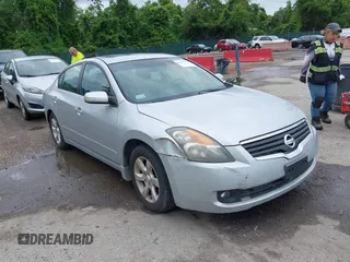 2009 Nissan Altima SE z VIN 1N4BL21E39C198063, wystawiony jako IAAI lot #42247034 z przebiegiem 156 602 mil mil oraz . Historia ofert i sprzedaży dostępna na DreamBid. Obrazek 1.