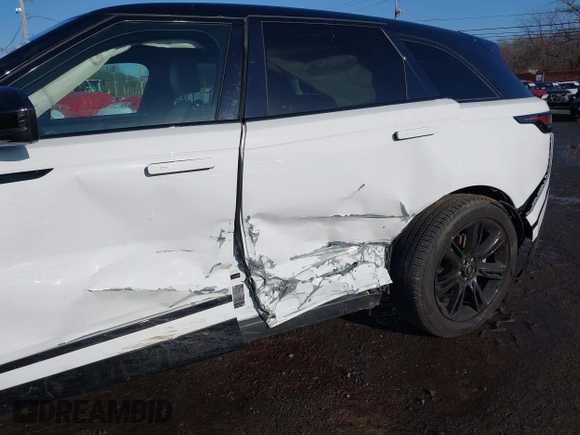 2022 Land Rover Range Rover Velar R-Dynamic S z VIN SALYT2EX7NA341627, wystawiony jako IAAI lot #41111238 z przebiegiem 18 982 mil mil oraz . Historia ofert i sprzedaży dostępna na DreamBid. Obrazek 18.