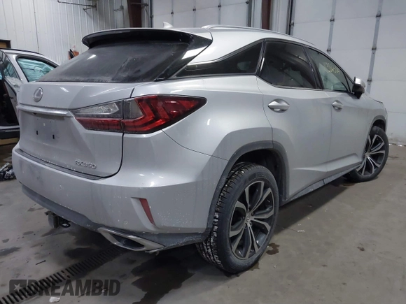 2017 Lexus RX with VIN 2T2BZMCAXHC067275, listed as a IAAI auction lot 41386504 with 100,477 mi miles. Bid and sale history available at carsss.com. Image 4.