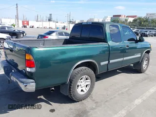 2000 Toyota Tundra SR5 with VIN 5TBRT3417YS122889, listed as a IAAI auction lot 41711107 with 288,475 mi miles and . Bid and sale history available at DreamBid. Image 4.